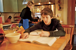 boy_homework_mom_cooking